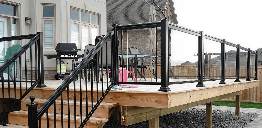 Handrail installation on a deck staircase for safety and code compliance in Ogden, UT